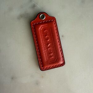 Coach Orange Red Patent Leather Hangtag